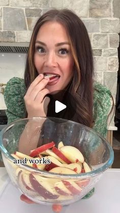 a woman eating apples in a bowl with the words and works below her on it