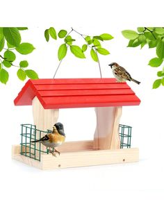 two birds are perched on top of a bird feeder that is made out of wood