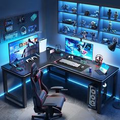 a desk with two monitors and a gaming chair in front of it, all lit up by blue lights