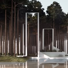 an artistic sculpture in the middle of a forest filled with tall trees and grass on either side of a body of water