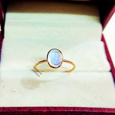 Band : Goldsmith Jewellers Material : 14 k Gold Gemstone : Rainbow Moonstone Moonstone Stone Wight : 1.80 Caret, Stone Size : 8 x 6 mm Ring Wight : 1.310 gm Stone Shape : Oval Band Color :  Gold Ring Size : All Size Available Made to Order Please Give Your Opinion or Feedback About The Product Note  : This Ring You can be Put All Stones of Your Choice https://www.etsy.com/in-en/your/shops/GoldsmithJewellers/onboarding/listings/create Moonstone Wedding Band, Gold Ring Stacking, Gold Moonstone Ring, Dainty Gold Ring, Handmade Gold Ring, Must Have Jewelry, Dainty Gold Rings, Ring Mountings, Moonstone Stone