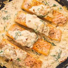 salmon and gravy in a skillet on a table