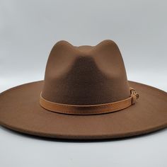 Brand New-Never Worn-Felt Fedora Hat. Size Adjustable Drawstring For Fit. Faux Leather Strap. Brown Adjustable Fedora Hat, Artisan Brown Fedora Hat, Traditional Brown Fedora Hat, Rustic Brown Brimmed Fedora, Newspaper Hat, Elegant Brown Wide-brim Fedora, Green Baseball Cap, Green Bay Packers Hat, Yankees Hat