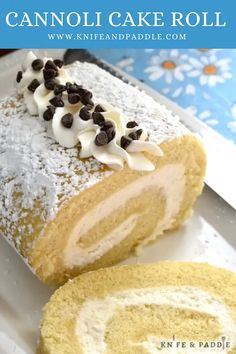 a close up of a cake roll on a plate