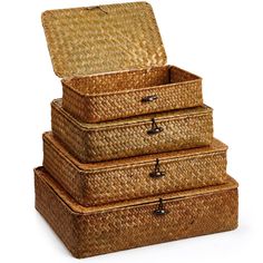 three wicker boxes stacked on top of each other