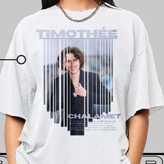 Chalamet Shirt, Chalamet Tees, Chalamet Tshirt, timothee chalamet, Timothee Fans, Timothee Gift, Timothee Merch, Timothee Shirt, Timothee Sweater, Timothee Sweatshirt, timothee t-shirt, timothee tee, Chalamet merch  DESCRIPTION  YOUR UNIQUE IDEAS WITH OUR UNIQUE DESIGN YOU CAN PERSONALIZE ; THE FONTS, COLORS AND EVERYTHING YOU WANT  Looking for a classic way to express your love to your loved ones? Our customizable tshirts is the perfect choice for you! Featuring a beautiful and timeless design, Chalamet Timothee, Merch Shirt, Timothee Chalamet, Unique Ideas, Arbor, Shirt Price, Unisex Shirt, Vintage Tshirts, San Jose