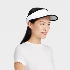 Why we're ALL IN: Adult visor hat made from lightweight fabric with added spandex for comfortable wear. A back push-lock offers a secure fit, while the UPF 50+ rated material offers protection from the harmful sun rays. A solid hue with a contrasting trim completes the sporty look. All in Motion™: Made for every move, priced for every day. White Breathable Sun Hat For Outdoor Activities, Adjustable Breathable Sun Hat For Sports, Adjustable Fit Functional Sun Hat For Sports, Functional Adjustable Fit Sun Hat For Sports, Functional Adjustable Sun Hat For Sports, Sporty Sun Hat With Upf 50+ For Sports, Breathable White Visor For Sports, White Sporty Visor For Sports, White Visor Sun Hat For Outdoor Activities