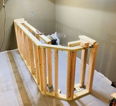 a room that is being built with wood