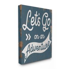 a wooden sign that says let's go on an adventure