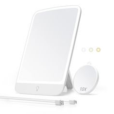 an electronic device and charger on a white background