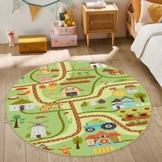 a child's room with a green rug and toy train tracks on the floor