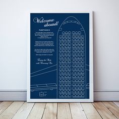 a blueprinted poster with the words welcome aboard on it in front of a white wall