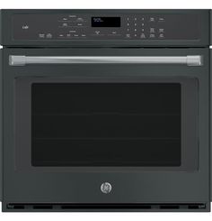 a black oven with the door open and an electronic display on it's side