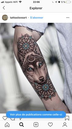 a person with a wolf tattoo on their arm