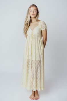 Slip on this maxi dress for an instantly-elevated outfit - the Lindsey is all lace and no fuss. We love its delicate vintage lace overlay, combined with a sweetheart neckline and puffed sleeves. It's a beautiful, feminine choice for any occasion! Available in two colorways. FIT: Runs true to size. MATERIAL: Self: 90% Nylon, 10% Spandex; Lining: 100% Rayon. GARMENT DETAILS: Lightweight maxi dress with an inverted empire waist silhouette. Features a low sweetheart neckline, ruffled short sleeves, and a self-tie ribbon accent at the bust. Finished with a flounced ruffled hem, and smocked back panel. Partially lined with mini-skirt length lining. SIZE GUIDE: S (2-4) / M (6-8) / L (10-12) MODEL DETAILS: Mackenzie - Size S Heather - Size S Molly - Size XL Our Brunette Misses Model Our Blonde Mis Summer V-neck Maxi Dress With Scalloped Lace, Summer Maxi Dress With Scalloped Lace, Sweetheart Neckline Lace Dress With Lace Top, White Lace Maxi Dress With Sweetheart Neckline, Scalloped Lace V-neck Maxi Dress, V-neck Lace Maxi Dress With Scalloped Edges, V-neck Lace Maxi Dress With Scalloped Lace, V-neck Scalloped Lace Maxi Dress, Flowy Lace Dress With Lace Patchwork