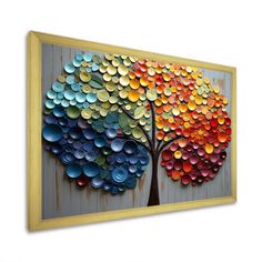 a painting with colorful circles painted on the side of it, and a tree in the middle