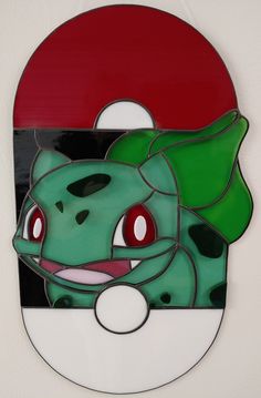 a close up of a pokemon pin on a wall