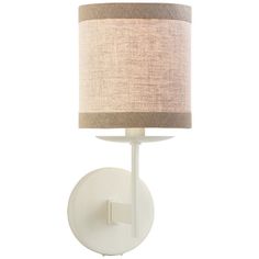 a white wall light with a beige shade on the top and bottom half of it