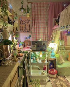 a room filled with lots of clutter and furniture next to a window covered in curtains