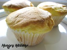 three muffins sitting on top of a white plate with the words hungry kitten