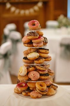 a stack of donuts sitting on top of a table