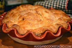 a pie sitting on top of a wooden table