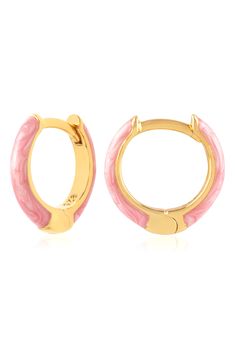 Easy-to-wear hoop earrings will add significant polish to even your most casual ensembles. 1/2" drop; 1/8" width Hinge with snap-post closure Sterling silver with goldtone plate/enamel Imported Pink Enamel Hoop Earrings, Nickel Free Enamel Hoop Jewelry, Nickel-free Enamel Round Hoop Earrings, Nickel-free Enamel Hoop Jewelry, Gold Enamel Hoop Huggie Earrings, Gold Enamel Huggie Earrings, Trendy Enamel Huggie Earrings, Pink Enamel Hoop Jewelry, Trendy Gold Enamel Hoop Earrings