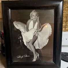 an old black and white photo of a woman dancing