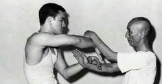 Yip Man, master of Wing Chun, spars with student Bruce Lee. Movie Memorabilia, The Master, Kung Fu, Training Programs