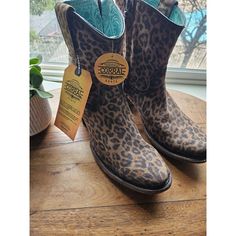 Step Out In Style With These Corral Western Boots! These Boots Feature A Trendy Leopard Print Pattern On A Brown Leather Upper With A Pointed Toe And Mid-Calf Shaft Style. The Boots Have A Zip Closure And A Mid-Height Block Heel For Comfortable Wear. They Are Perfect For Casual, Formal, Or Party/Cocktail Occasions. These Women's Boots Are Made By Corral Boot, A Leading Brand In The Western Boot Industry. The Boots Are New Without A Box, And They Are Made Of High-Quality Leather With A Leather Li Leopard Print Leather Ankle Boots, Corral Boots, Brown Boots, Western Boots, High Quality Leather, Block Heels, Bootie Boots, Leopard Print, Brown Leather