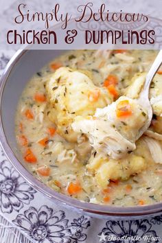 a bowl filled with chicken and dumplings on top of a table