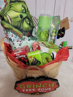 a basket filled with candy and other items