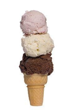 three scoops of ice cream are stacked on top of each other in a cone