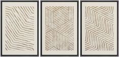 three framed art pieces, each with different lines and shapes on the same wallpaper