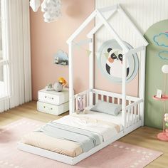 a child's bedroom decorated in pastel colors