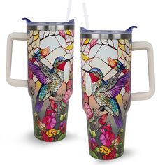 two colorful hummingbirds on floral stained glass mugs with straw in the bottom and handles