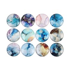 nine marbles with different colors and designs on them