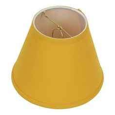 a yellow lamp shade on a white background