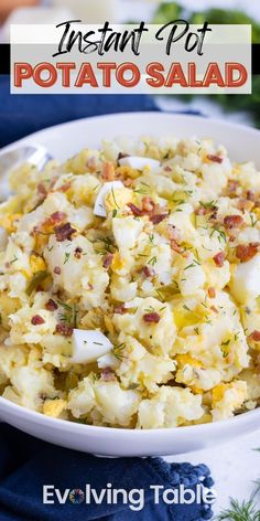 a white bowl filled with potato salad on top of a table