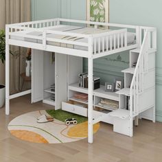 a white loft bed with stairs to the top and desk underneath it in a living room