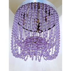 a purple chandelier hanging from the ceiling