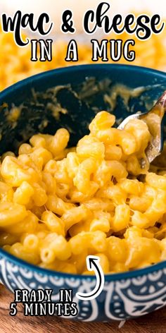 macaroni and cheese in a blue bowl with text overlay reading mac & cheese in a mug