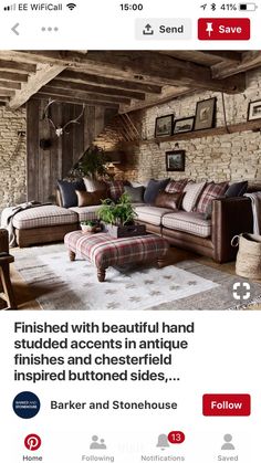 an image of a living room with furniture on the bottom right hand corner and brick walls