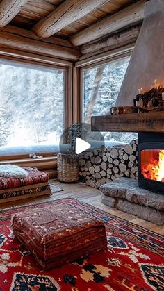 a living room filled with furniture and a fire place next to a large window covered in snow