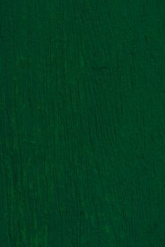 an image of a green background that looks like it is painted with wood grains