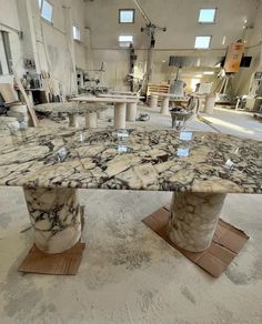 a marble table in a large room