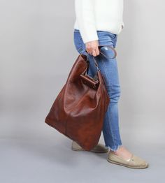 "Oversized bag - large leather tote bag -XXL handbag BROWN LEATHER BAG Height: 46 cm / 18.2\" Width: 43 cm / 17\" Width at the base: 32 cm / 12.6\" Min handle drop: 20 cm / 10.2\" Length of handle: 44 cm / 17.3\" Long strap: max 110 cm / 43.5\" Depth: 13 cm / 5.1\" Large and stylish tote bag made from high quality leather. Spacious interior provides room for all the daily essentials and more. This bag is perfect as your everyday bag, which can fit an IPAD, A4 files, books, magazines, cosmetic ba Large Shoulder Bag With Handles For Errands, Large Brown Satchel For Daily Use, Large Rectangular Hobo Bag For Daily Use, Large Double Handle Bucket Bag For Everyday Use, Large Double Handle Hobo Bag For Daily Use, Large Brown Satchel For Everyday Use, Brown Large Satchel For Everyday Use, Large Everyday Hobo Shoulder Bag, Large Satchel Shoulder Bag For Everyday Use