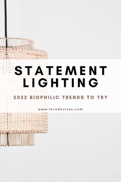 a chandelier with the words statement lighting in black and white on top of it