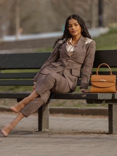 This Structured Plaid Suit Set is the perfect choice for a professional or formal look. Crafted with a deconstructed cut blazer, it features a detailed leather patch on the shoulder and sleeve and boasts a single button closure and a decorative flap pocket for added style. Features a high waist ankle-length pants with zip and metal hook closure on the side. The pants has pockets on both sides. Model is 5ft 4in and she is wearing UK size 6/XS Note - Olarsgrace uses UK sizing format. Cut Blazer, Plaid Brown, Plaid Suit, Formal Look, Kimono Dress, Ankle Length Pants, Formal Looks, Suit Set, Tartan Plaid