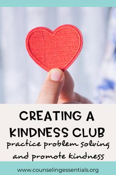 a hand holding up a red heart with the words creating a kindness club practice problem solves